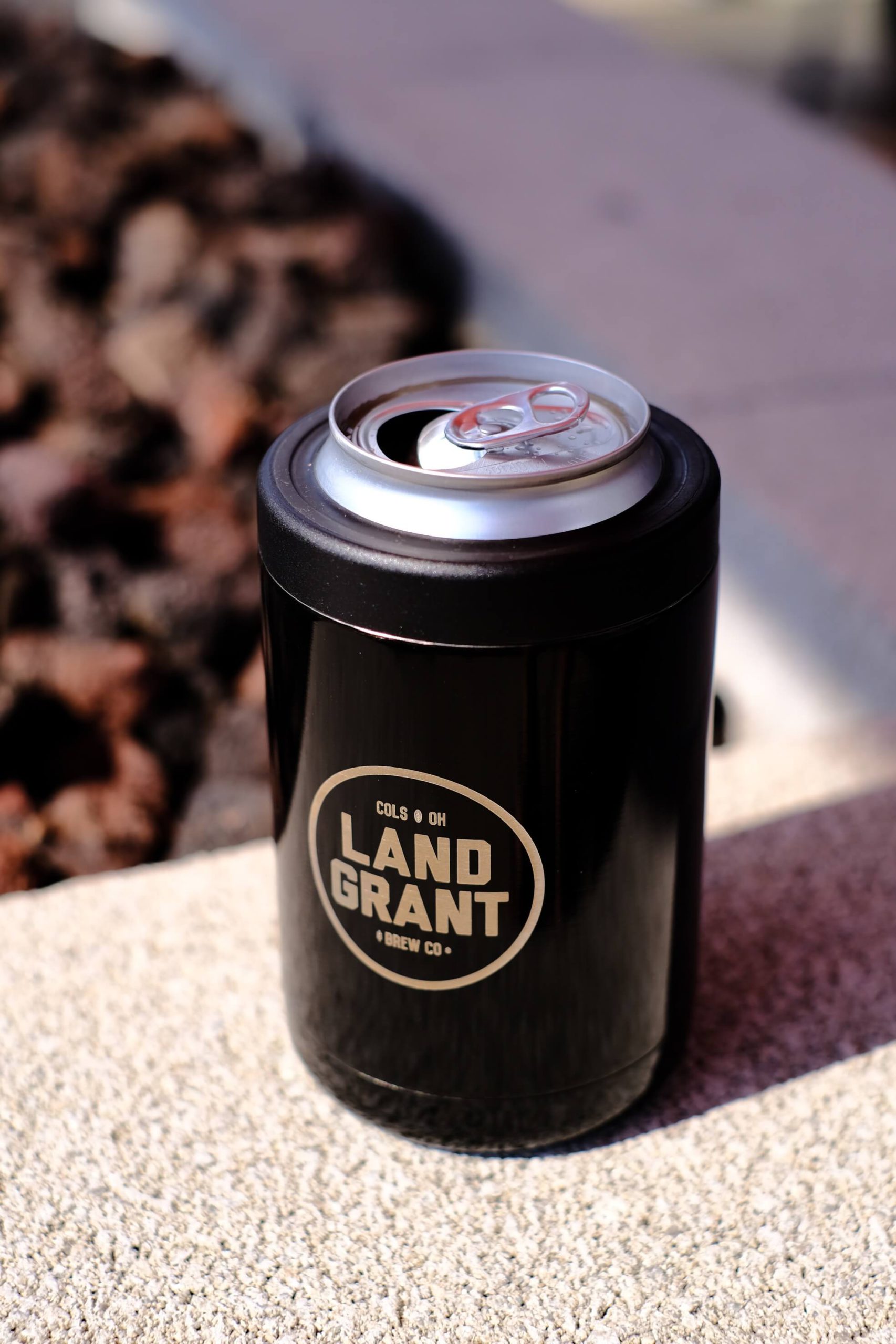 Koozie Logo / Hand out custom koozies to your employees or customers and spread a logo or 